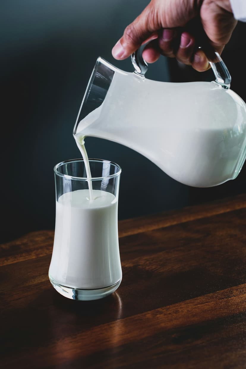 Carton and glass of fresh farm milk